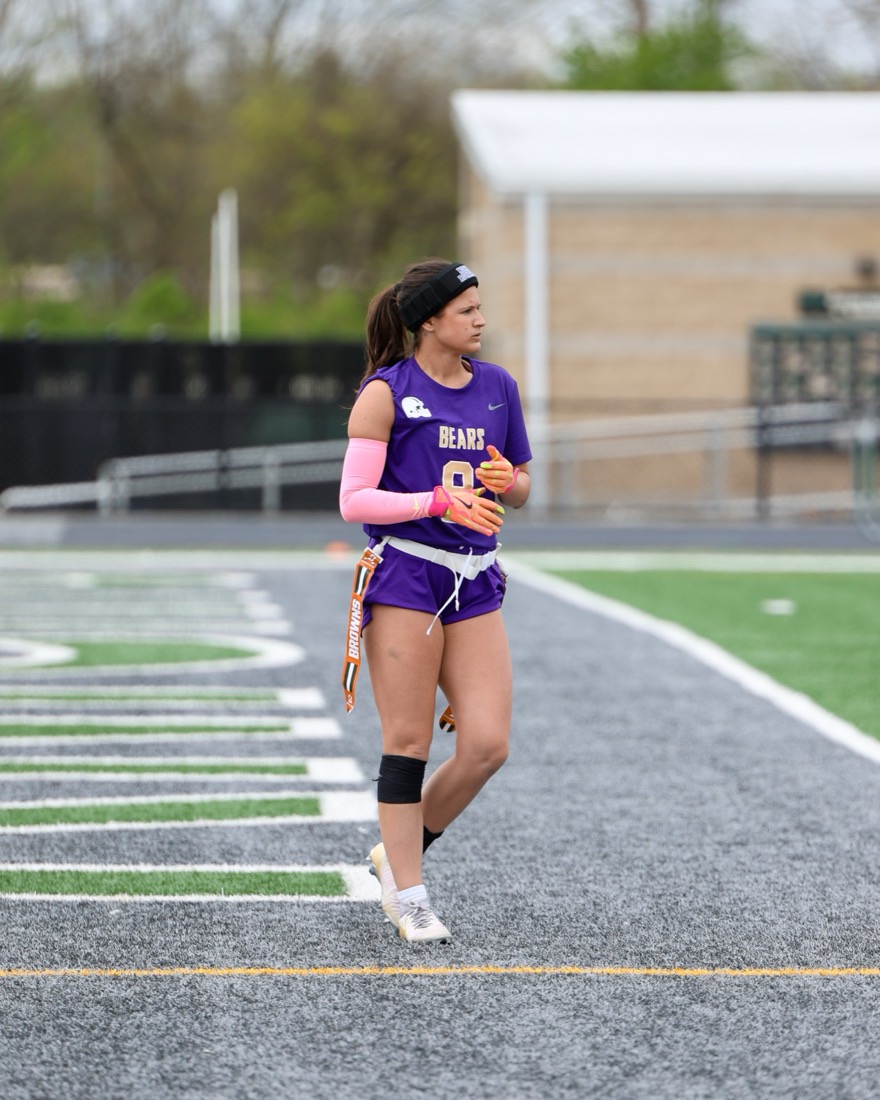 Flag football player on the sideline